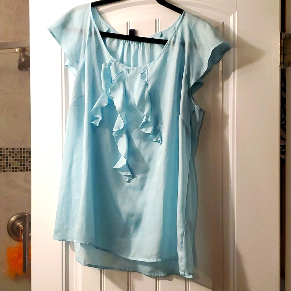 Sleeveless ruffle front work top